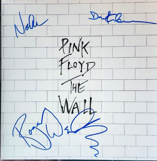 Pink Floyd signed the Wall album in blue marker from Boston memorabilia