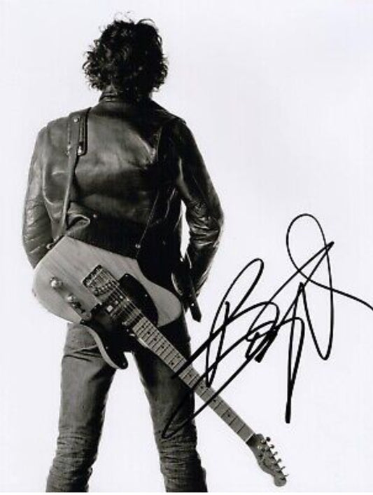 Bruce Springsteen signed photo face to the wall