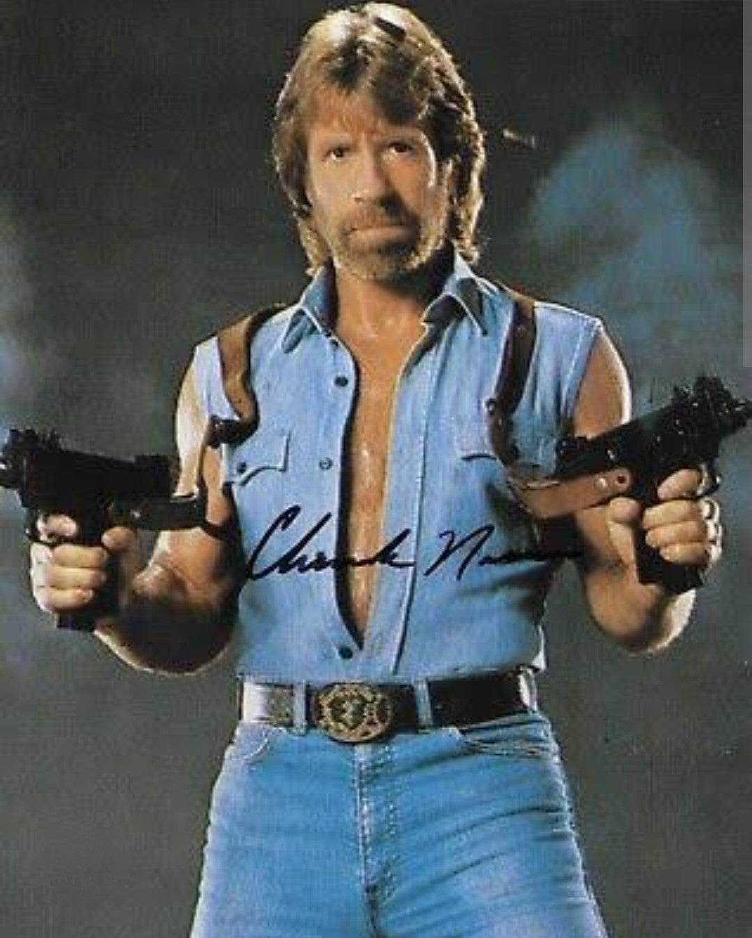 Chuck Norris signed photo guns out Boston memorabilia