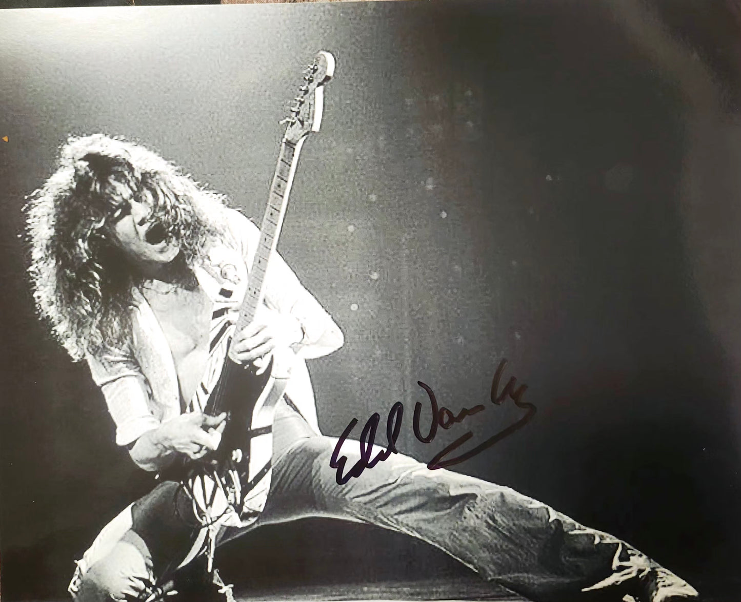 Eddie Van Halen signed photo playing on stage black marker