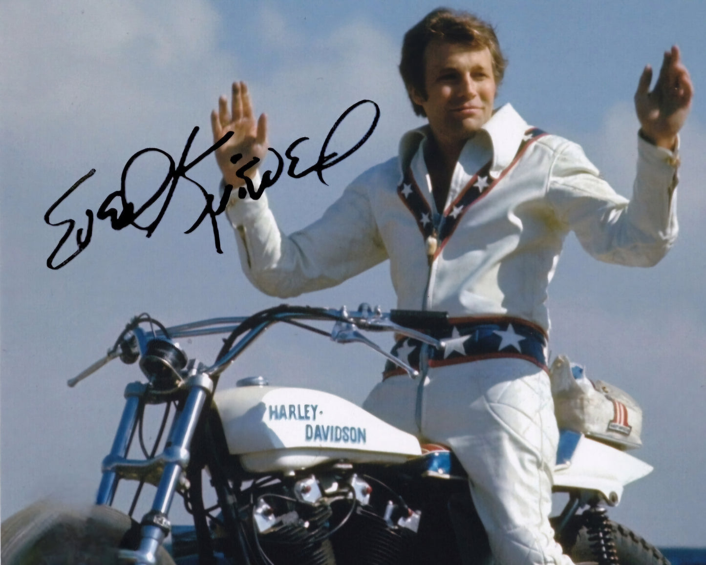 Evel Knievel signed photo hands and air on motorcycle