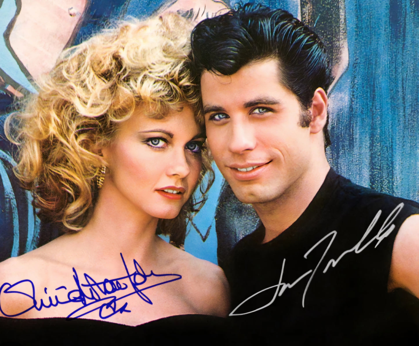 Olivia Newton-John and John Travolta signed photo blue marker silver marker posing together