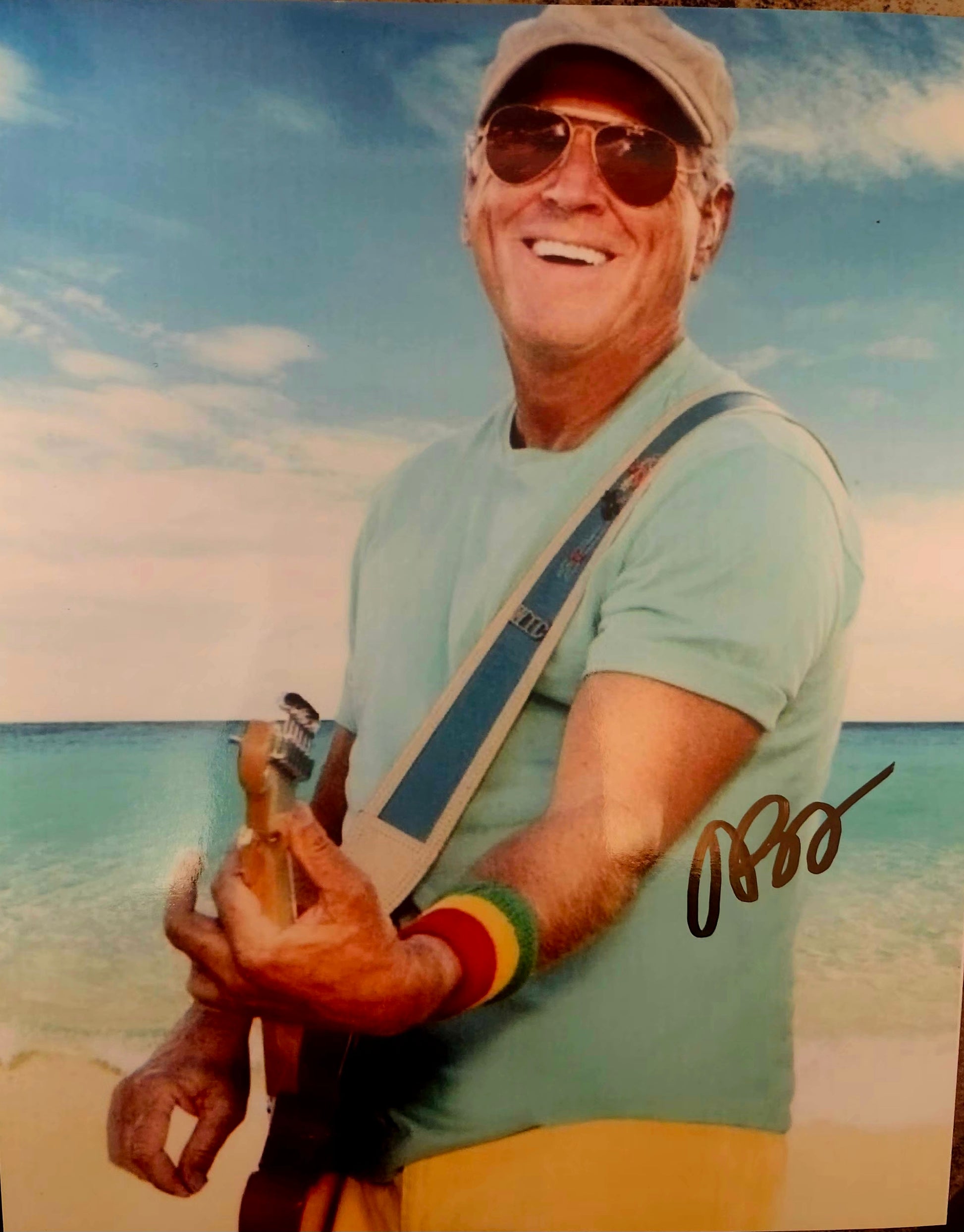 JImmy Buffett Autographed photo on the ocean