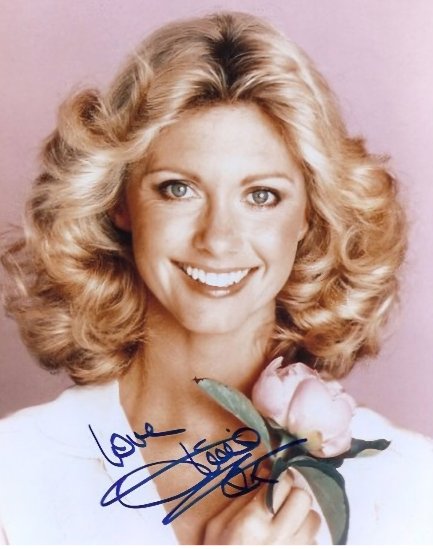 Olivia Newton-John signed photo in blue marker