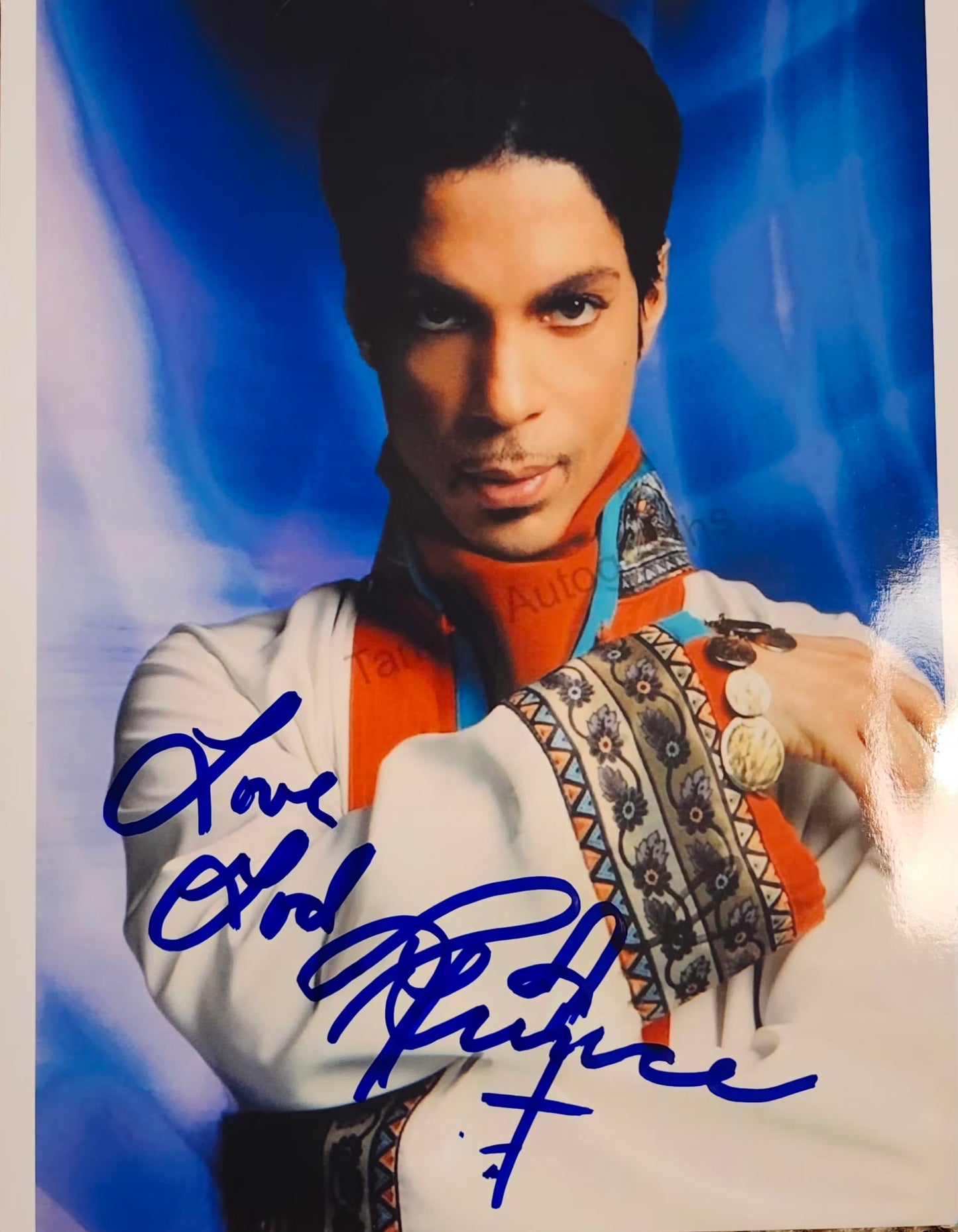 Prince signed photo blue marker inscribed love God