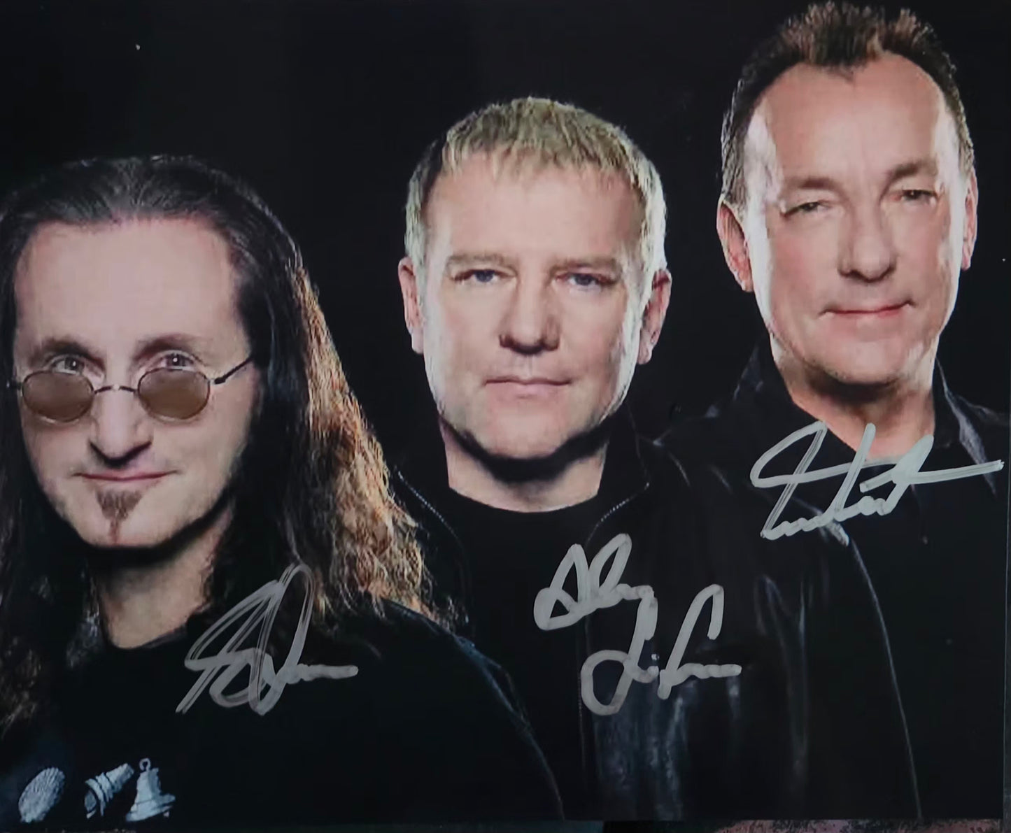 Rush band signed photo silver marker
