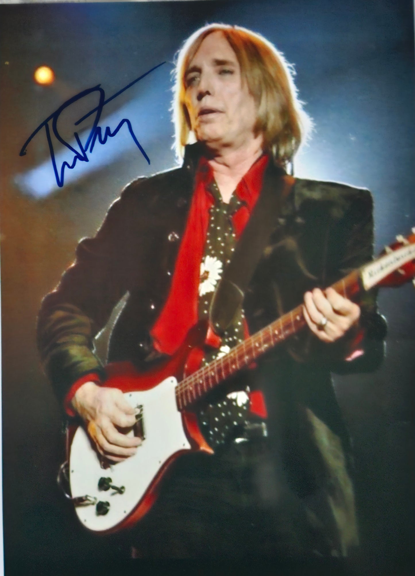 Tom Petty signed photo on stage blue marker