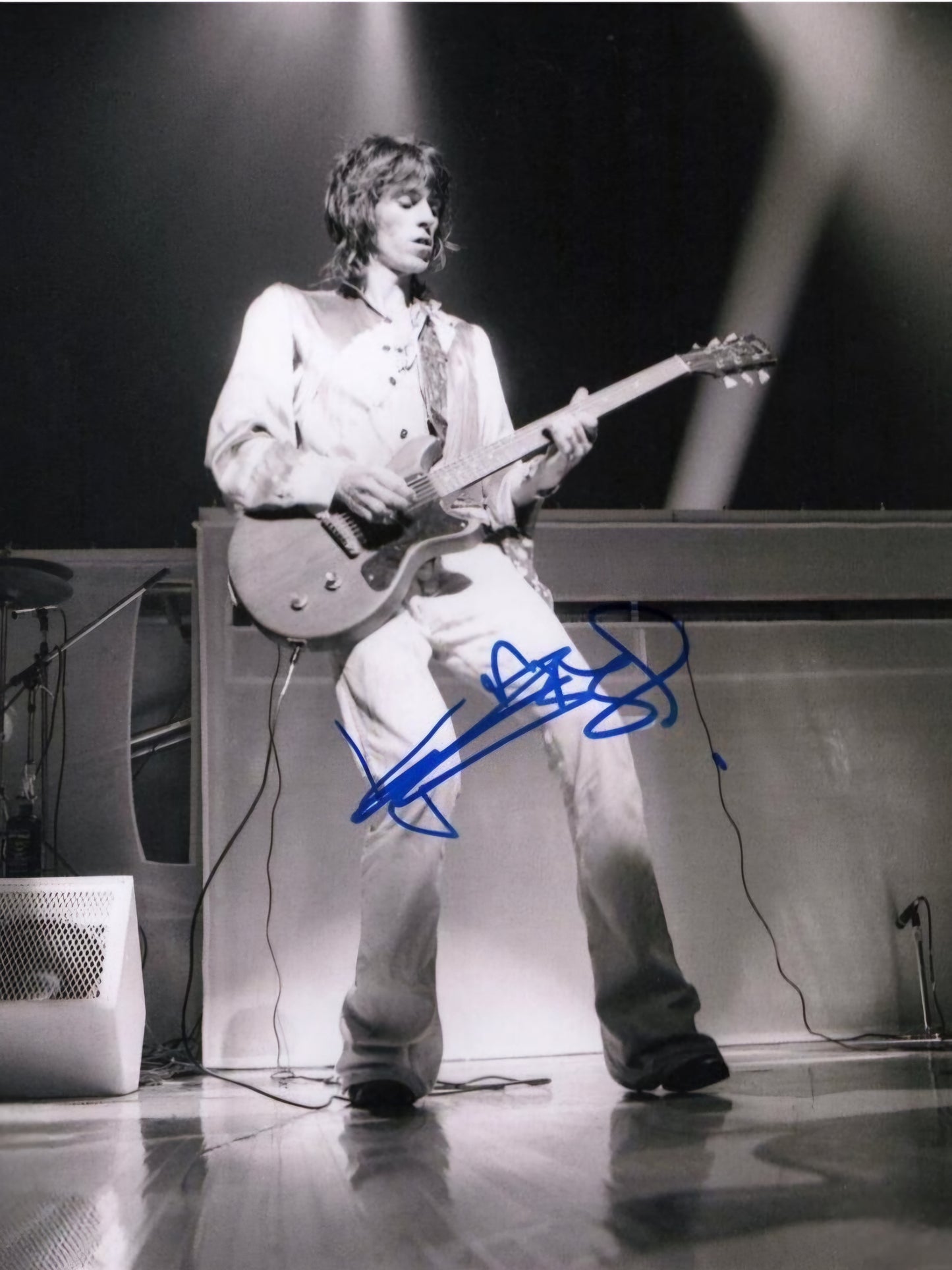 keith richards signed photo in blue marker on stage