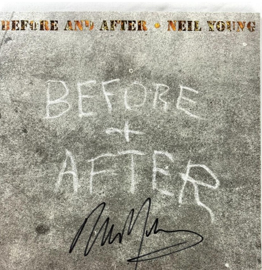 Neil Young signed album before and after Boston revilla