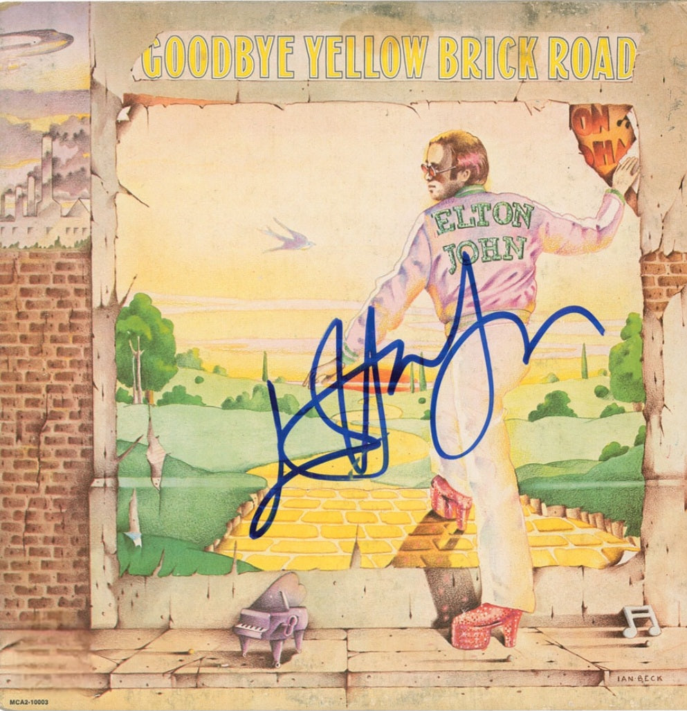 Elton John signed album titled yellow brick road from Boston memorabilia