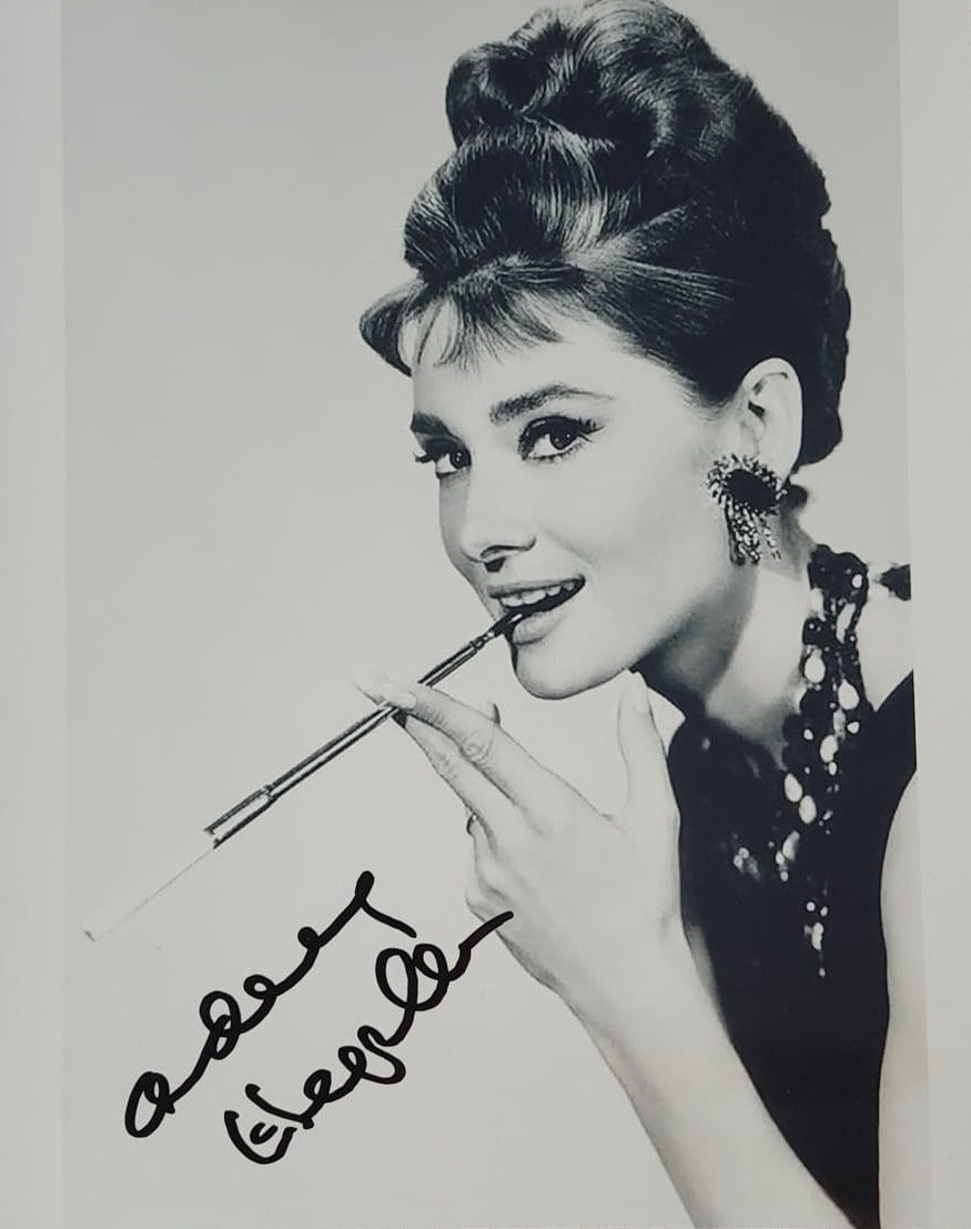 Audrey Hepburn signed photo with cigarette in her mouth