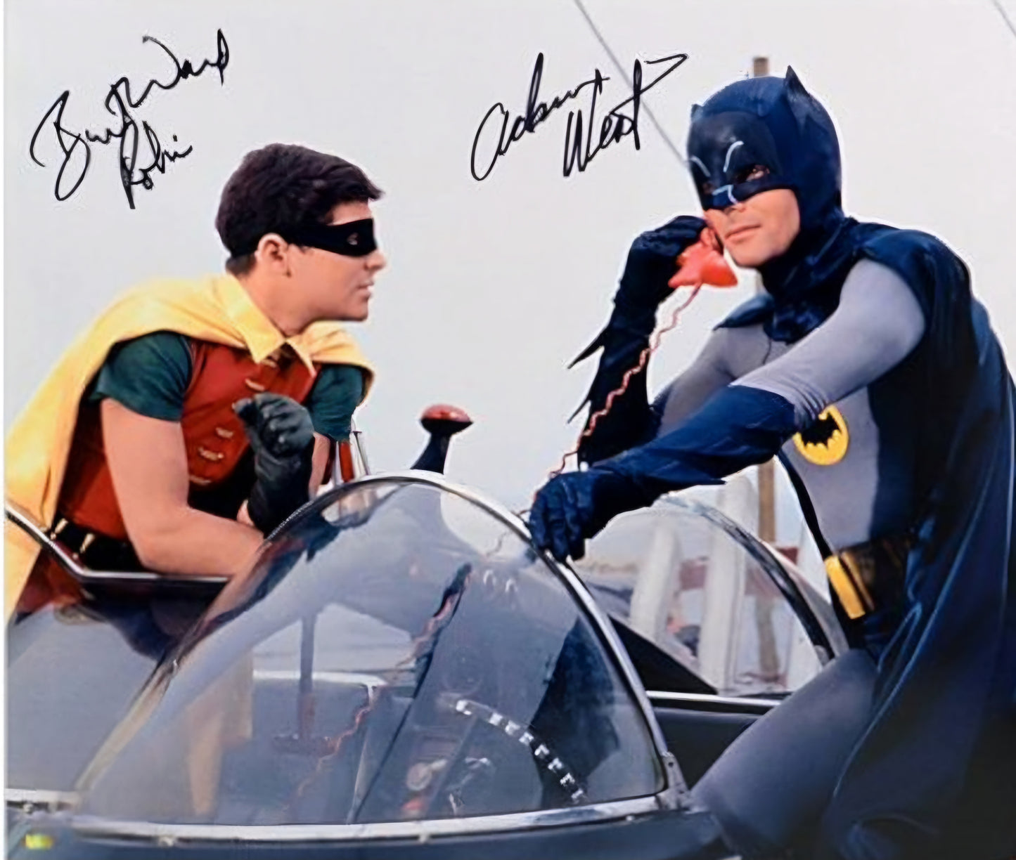 Batman and Robin signed photo riding motorcycle
