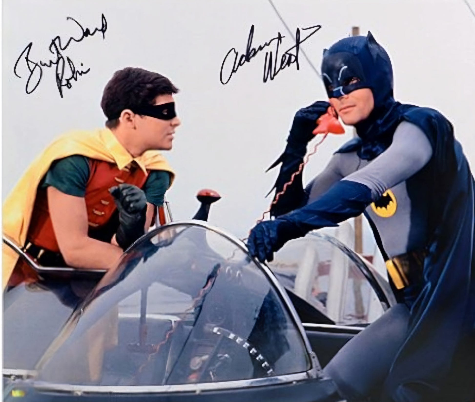 Batman and Robin signed photo riding motorcycle