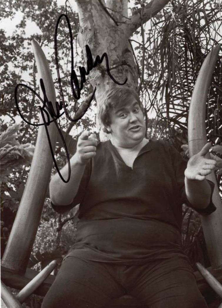 John Candy signed autographed photo sitting between elephant tusks