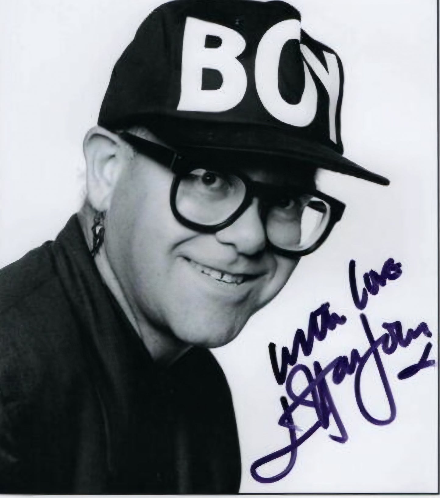 Elton John signed photo wearing hat