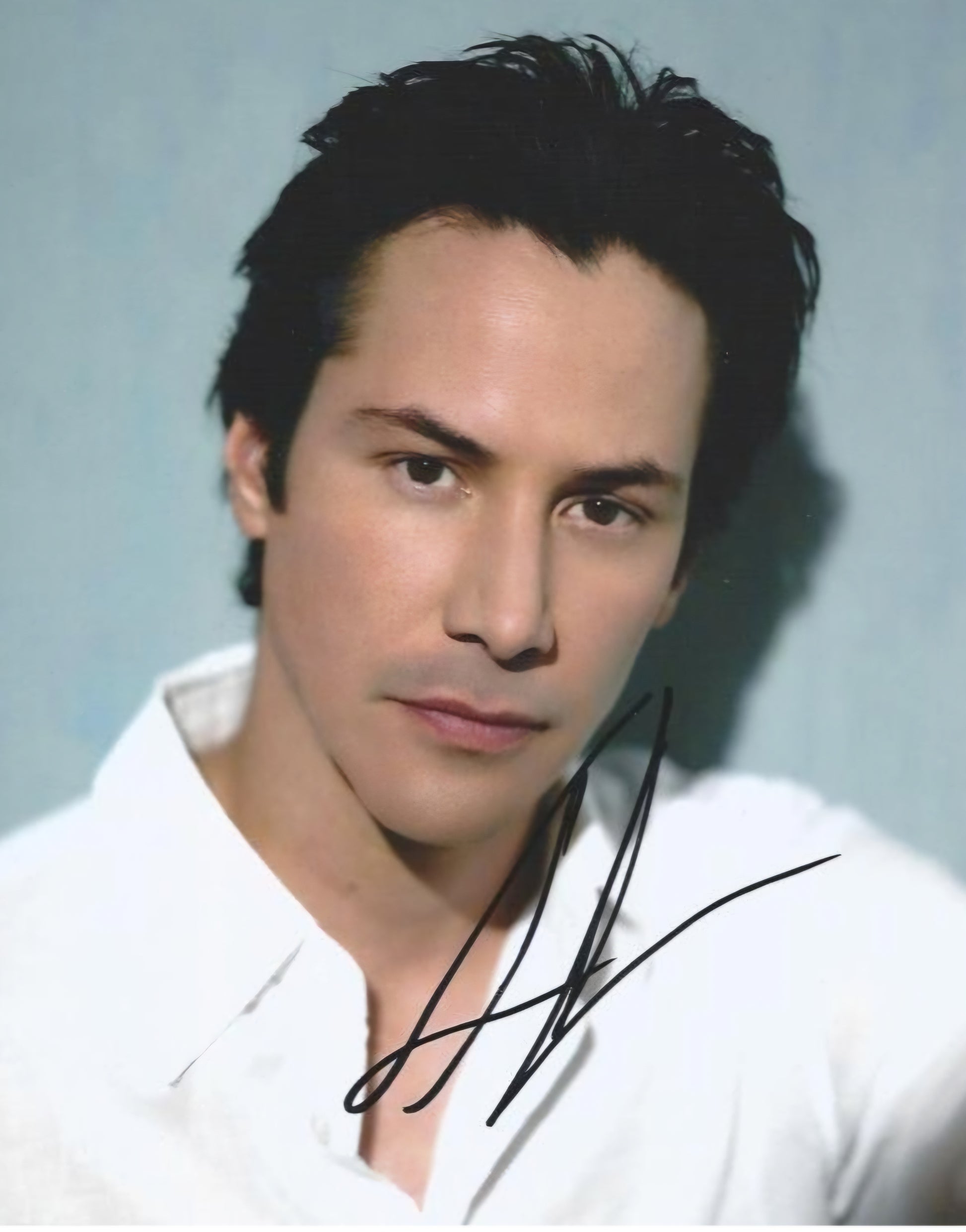 Keanu Reeves signed photo young man image