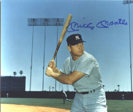 Mickey Mantle signed photo with bat on field