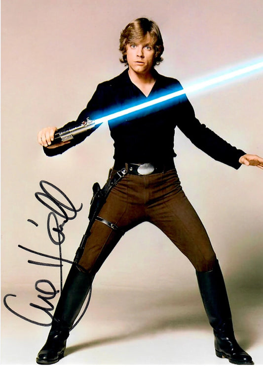 Mark Hamill Star Wars action photo with laser sword 