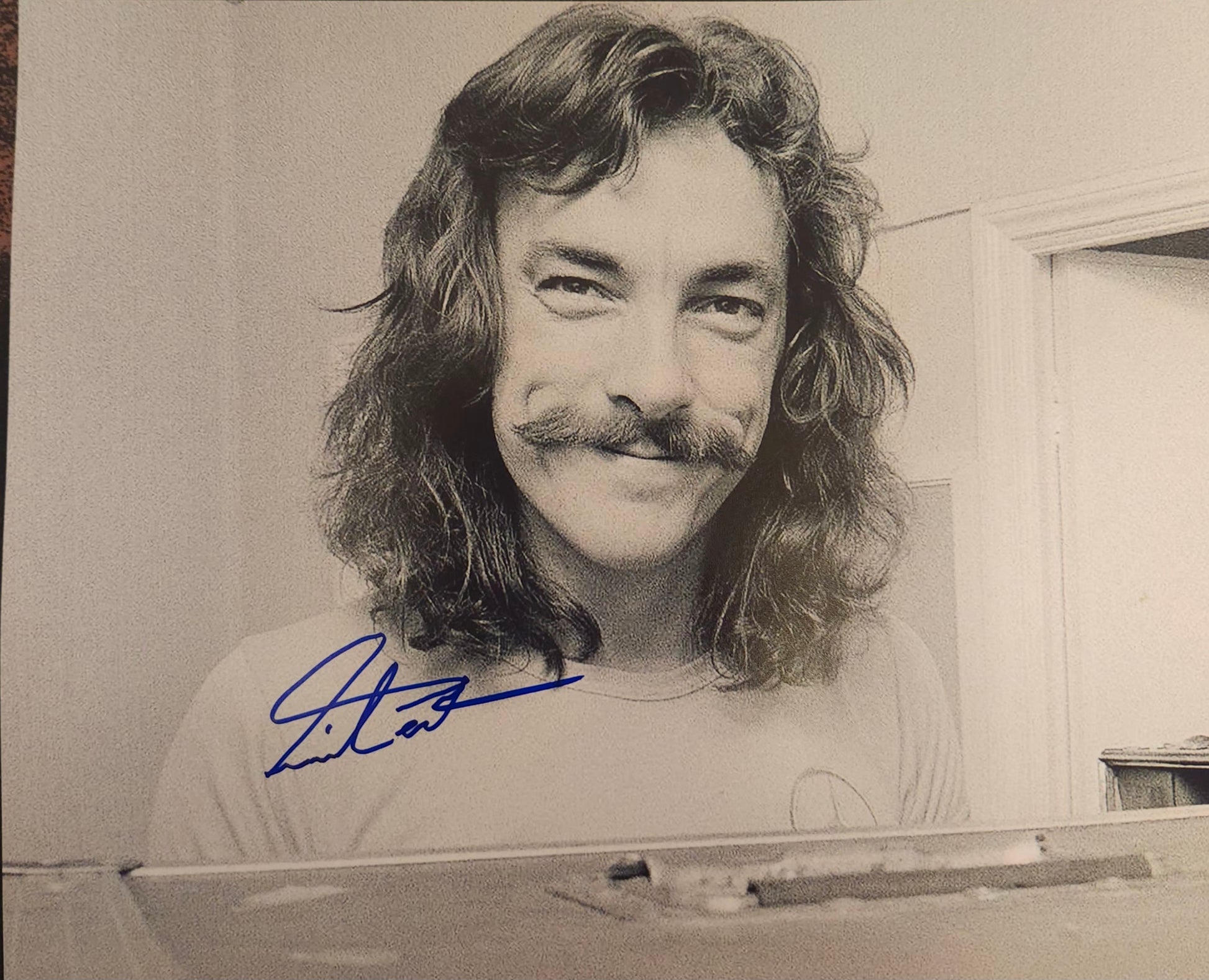 Neil Peart signed photo blue marker