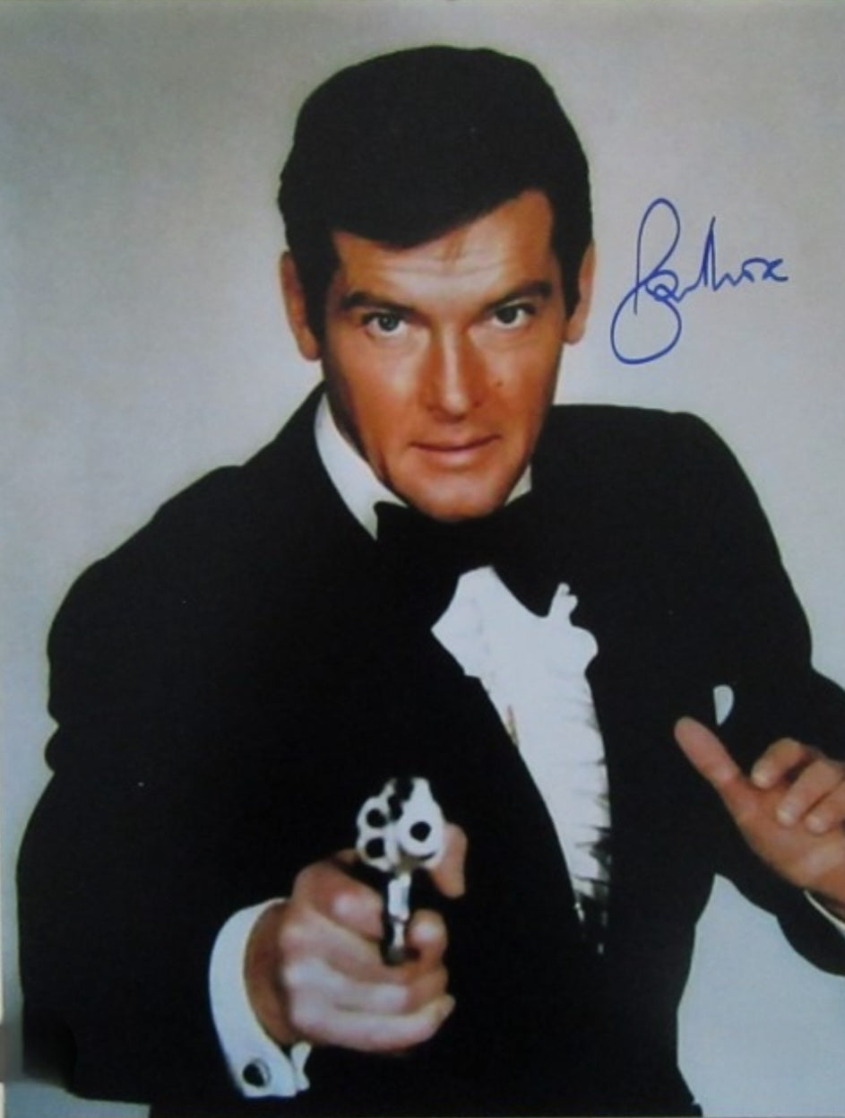 Roger Moore signed action photo pulling the gun movie screen