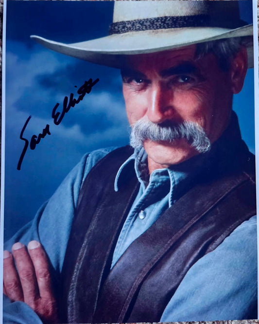 Sam Elliott signed photo black marker blue background