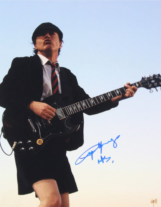 Angus Young signed photo the sky behind him