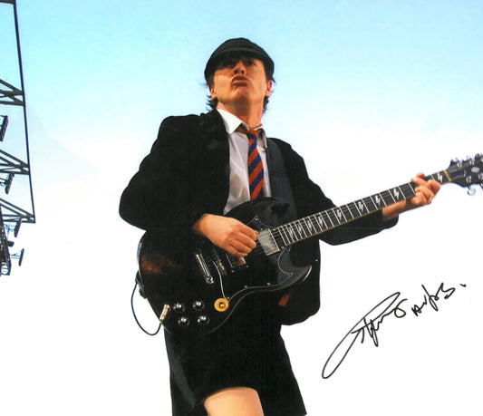 Angus Young signed photo on top Beckett autographs