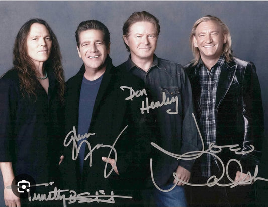 The Eagles band signed photo silver marker