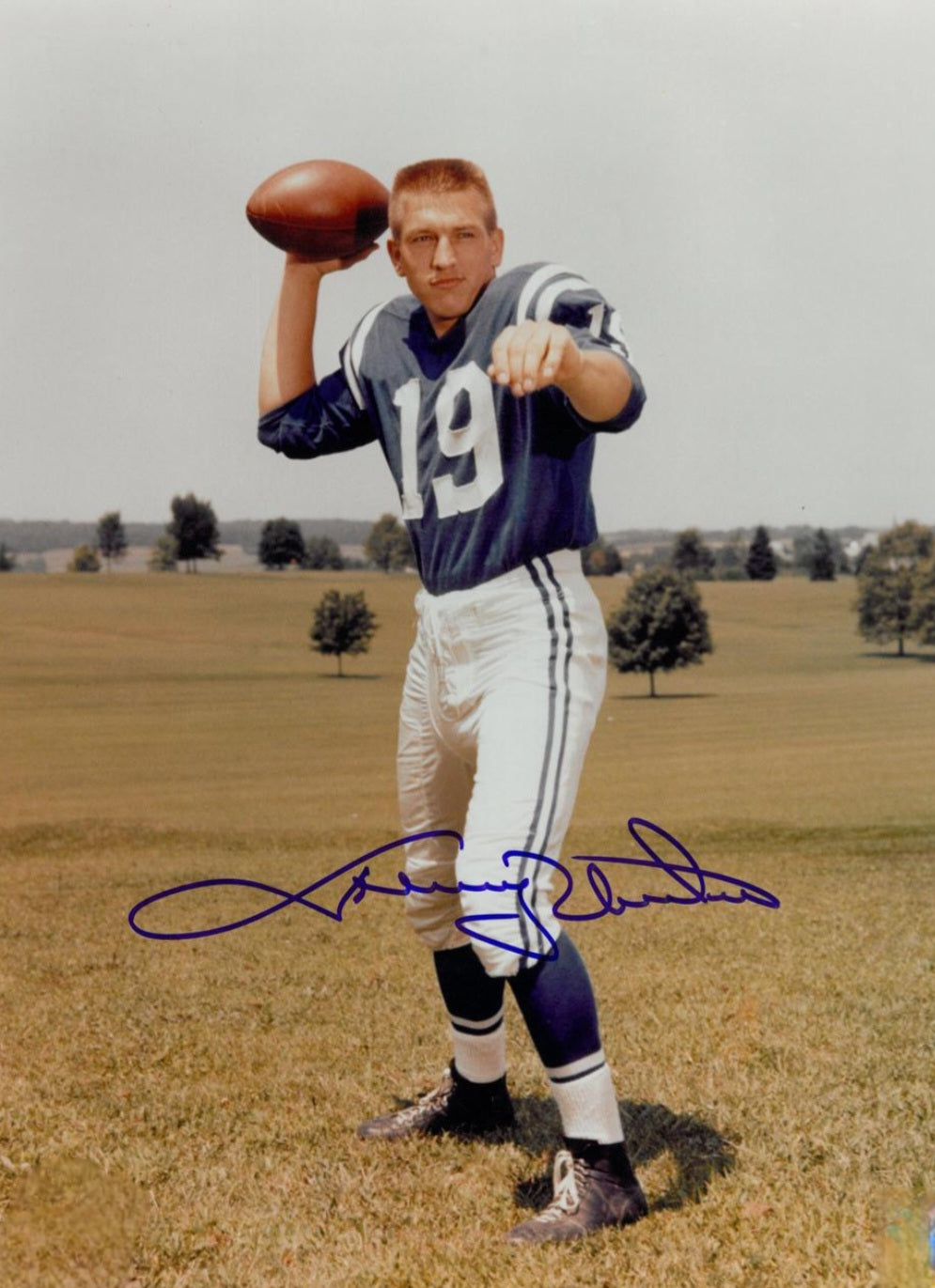 Johnny Unitas signed autographed photo on the field in throwing pose position Boston memorabilia