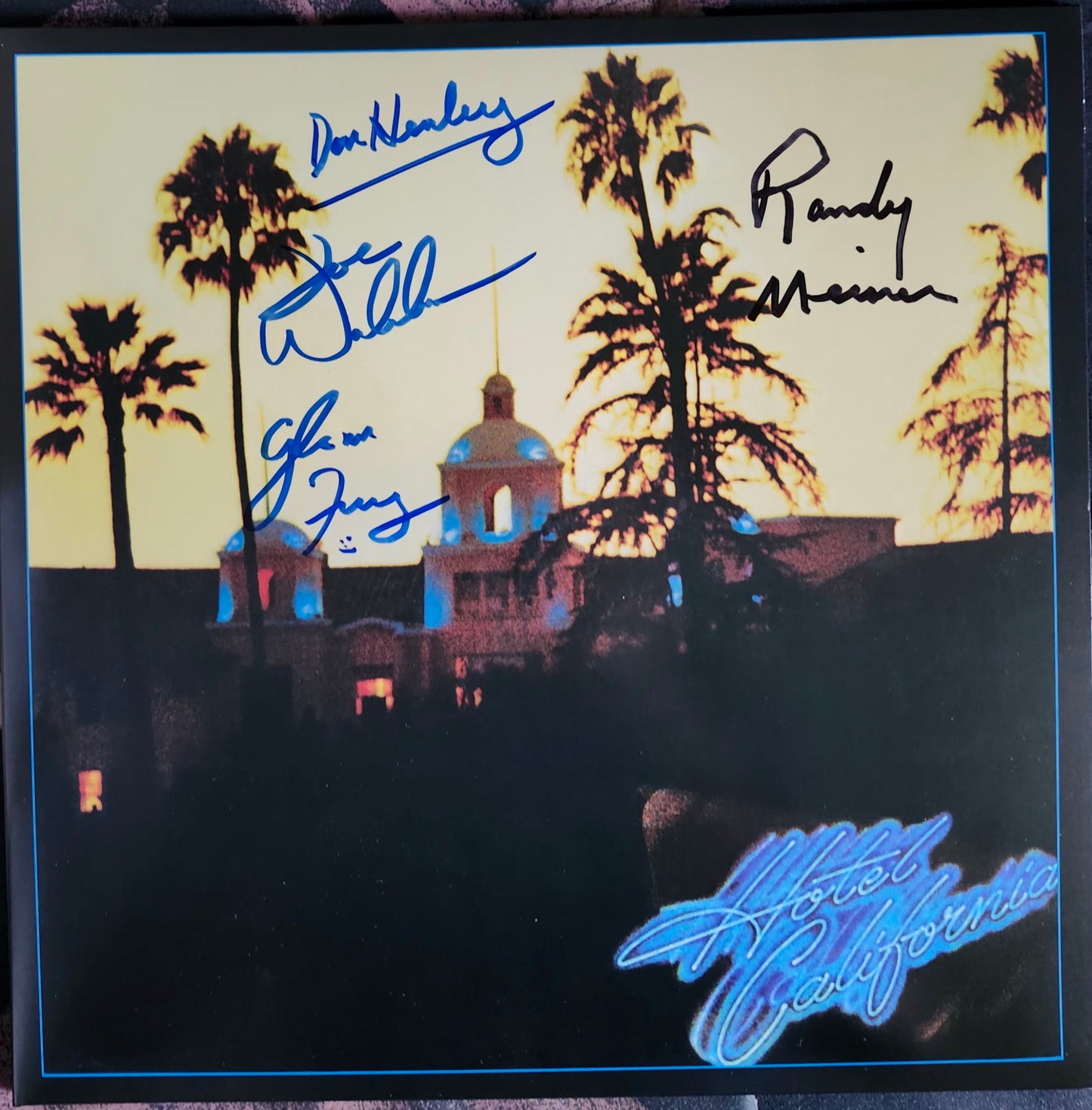 The Eagles signed Hotel California album black and blue marker