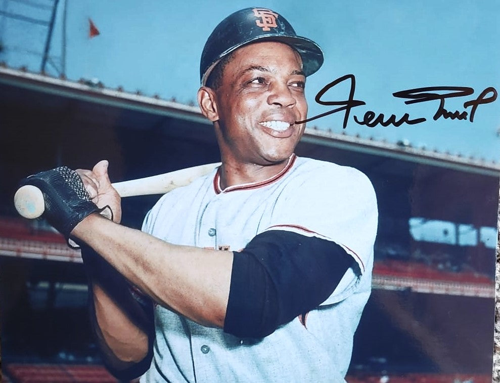 Willie Mays Signed Photo swinging bat on field