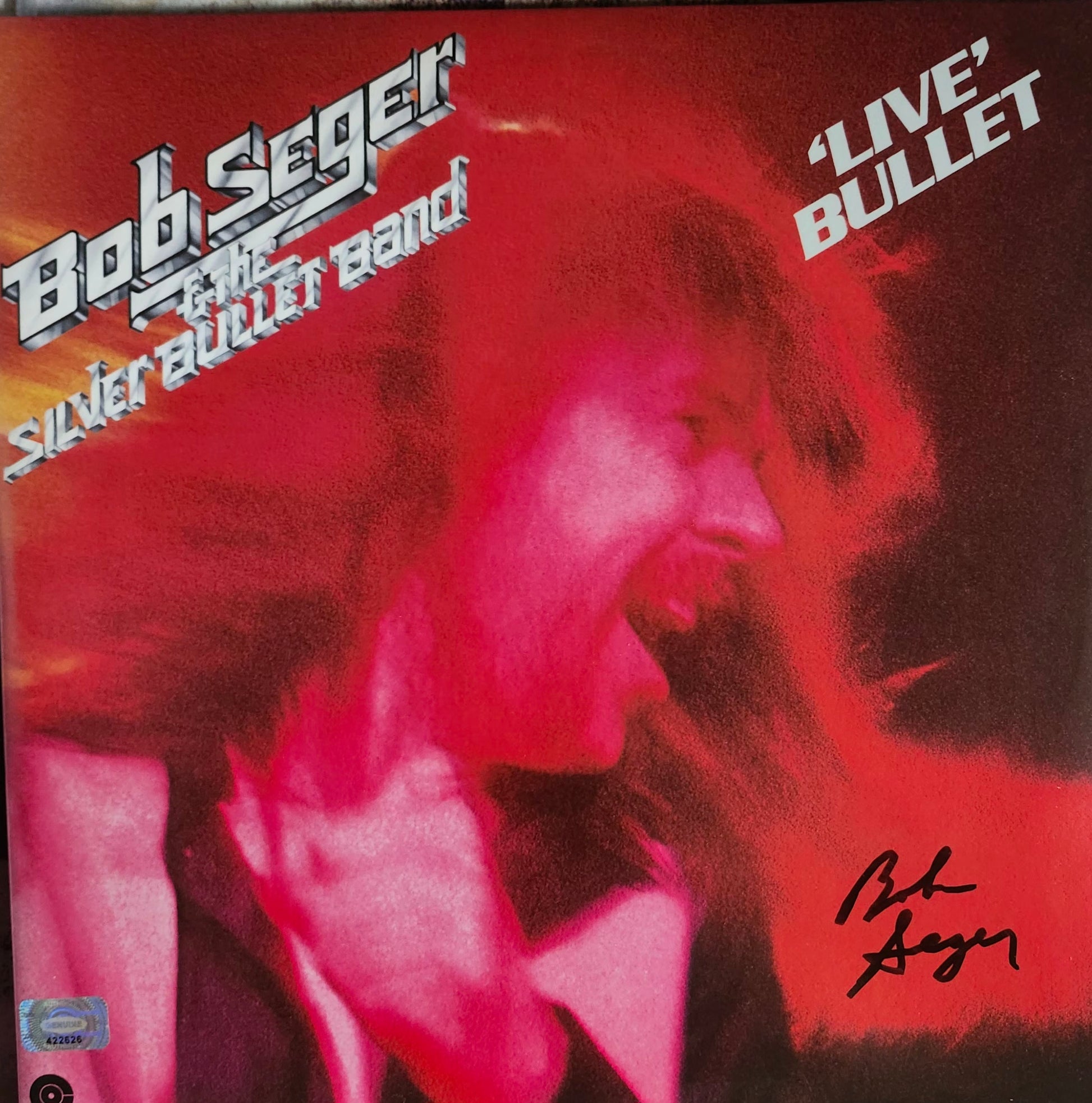 bob seger autograph on album cover black marker
