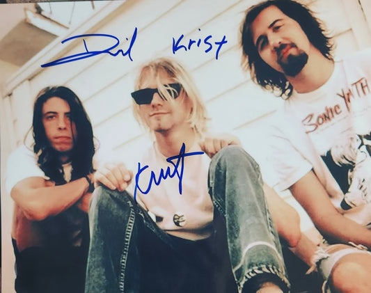 Nirvana band signed photo in blue marker from Boston memorabilia