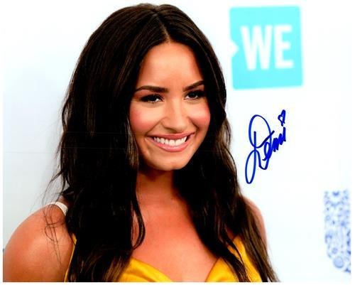 DEMI LOVATO signed autographed photo COA Hologram Beckett Autographs